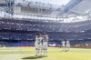 FILE - Real Madrid's Vinicius Junior celebrates with teammates after scoring the opening goal during a Spanish La Liga soccer match between Real Madrid and Betis at the Santiago Bernabeu stadium in Madrid, Spain, on Sept. 3, 2022. (AP Photo/Pablo Garcia, File)