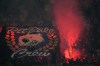 Inter Milan fans light flares as they cheer during a Serie A soccer match between Inter Milan and Cremonese at the San Siro stadium in Milan, Italy, Tuesday, Aug. 30, 2022. (AP Photo/Luca Bruno)