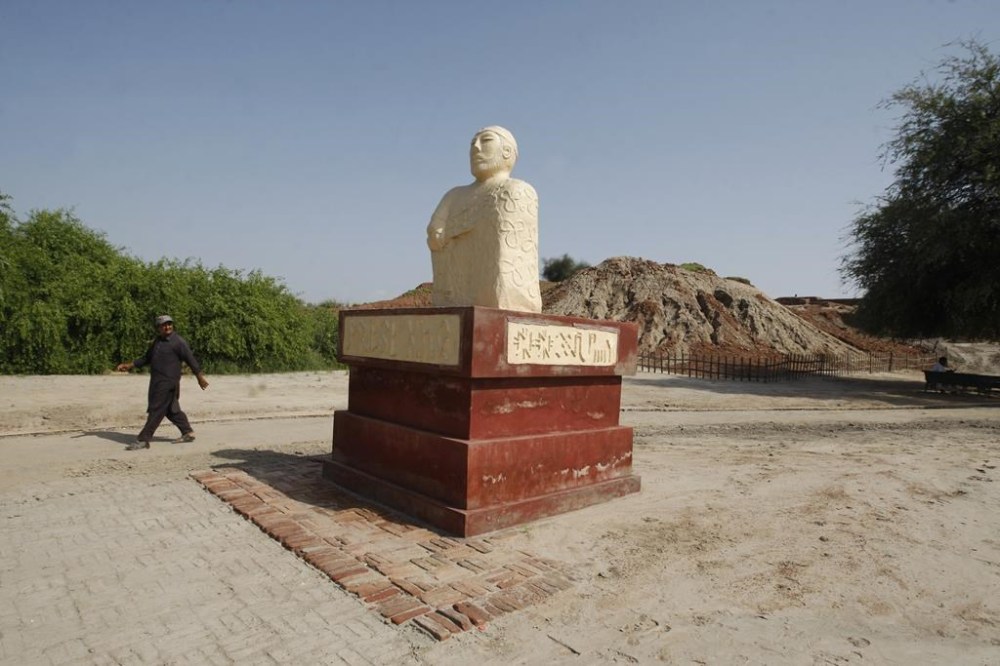 A Pakistani man walks in Ruins at Mohenjo Daro, a UNESCO World Heritage site, that suffered damage from heavy rainfall, in Larkana District, of Sindh, Pakistan, Tuesday, Sept. 6, 2022. The rains now threaten the famed archeological site dating back 4,500 years. The flooding has not directly hit Mohenjo Daro but the record-breaking rains have inflicted damage on the ruins of the ancient city, said Ahsan Abbasi, the site's curator. (AP Photo/Fareed Khan)