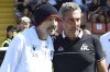 Bologna's coach Mihajlovic, left, and La Spezia's coach Luca Gotti pose for a photo ahead of the Italian Serie A soccer match between Spezia and Bologna, at Alberto Picco stadium in La Spezia, Italy, Sunday Sept. 4, 2022. (Tano Pecoraro/LaPresse via AP)