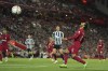 Liverpool's Mohamed Salah, right, reacts during the English Premier League soccer match between Liverpool and Newcastle United at Anfield stadium in Liverpool, England, England, Wednesday, Aug. 31, 2022. (AP Photo/Jon Super)