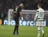 Real Madrid's Karim Benzema walks off after being substituted during the Champions League Group F soccer match between Celtic and Real Madrid at Celtic park, Glasgow, Scotland, Tuesday, Sept. 6, 2022. (AP Photo/Scott Heppell)