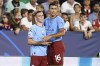 Manchester City's Phil Foden, left, celebrates with Manchester City's Rodrigo after scoring his side's second goal during the group G Champions League soccer match between Sevilla and Manchester City in Seville, Spain, Tuesday, Sept. 6, 2022. (AP Photo/Jose Breton)