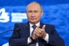 Russian President Vladimir Putin applauds during a plenary session at the Eastern Economic Forum in Vladivostok, Russia, Wednesday, Sept. 7, 2022. (Sergei Bobylev/TASS News Agency Host Pool Photo via AP)