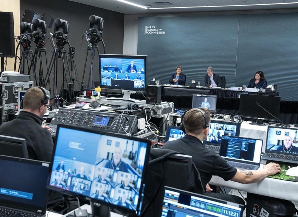 Commissioners Leanne Fitch, Michael MacDonald, chair, and Kim Stanton, left to right, conduct a virtual session on contemporary community policing, safety and well-being, at the Mass Casualty Commission inquiry into the mass murders in rural Nova Scotia on April 18/19, 2020, in Halifax on Wednesday, Sept. 7, 2022. Gabriel Wortman, dressed as an RCMP officer and driving a replica police cruiser, murdered 22 people. THE CANADIAN PRESS/Andrew Vaughan
