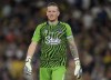 Everton's goalkeeper Jordan Pickford looks out during the English Premier League soccer match between Leeds United and Everton, at Elland Road Stadium in Leeds, England, Tuesday, Aug. 30, 2022. (AP Photo/Jon Super)