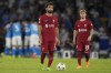 Liverpool's Mohamed Salah, centre, reacts after his team misses fourth goal during the group A Champions League soccer match between Napoli and Liverpool at the Diego Armando Maradona stadium in Naples, Italy, Wednesday, Sept. 7, 2022. (AP Photo/Andrew Medichini)