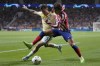 Atletico Madrid's Joao Felix, right, duels for the ball with Porto's Otavio during the Champions League Group B soccer match between Atletico Madrid and Porto at the Metropolitano stadium in Madrid, Spain, Wednesday, Sept. 7, 2022. (AP Photo/Bernat Armangue)