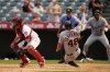Detroit Tigers' Kerry Carpenter (48) scores off of a single by Willi Castro during the seventh inning of a baseball game against the Los Angeles Angels in Anaheim, Calif., Wednesday, Sept. 7, 2022. (AP Photo/Ashley Landis)