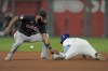 Kansas City Royals' Nate Eaton beats the tag by Cleveland Guardians shortstop Amed Rosario to steal second during the seventh inning of a baseball game Wednesday, Sept. 7, 2022, in Kansas City, Mo. (AP Photo/Charlie Riedel)