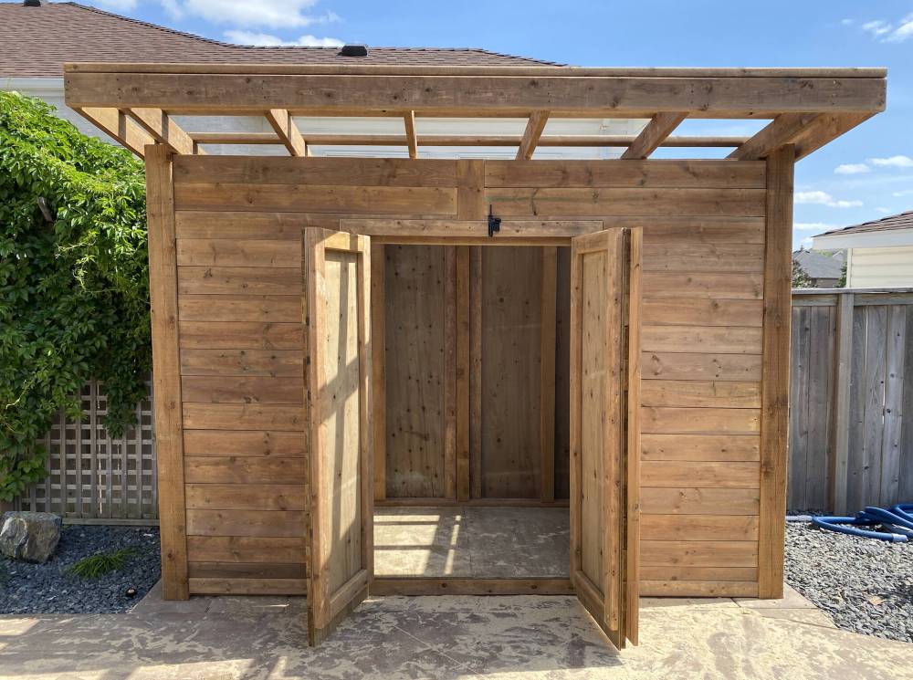 Marc LaBossiere / Winnipeg Free Press
Two French doors provide easy access for the backyard accessories that will be stored within.