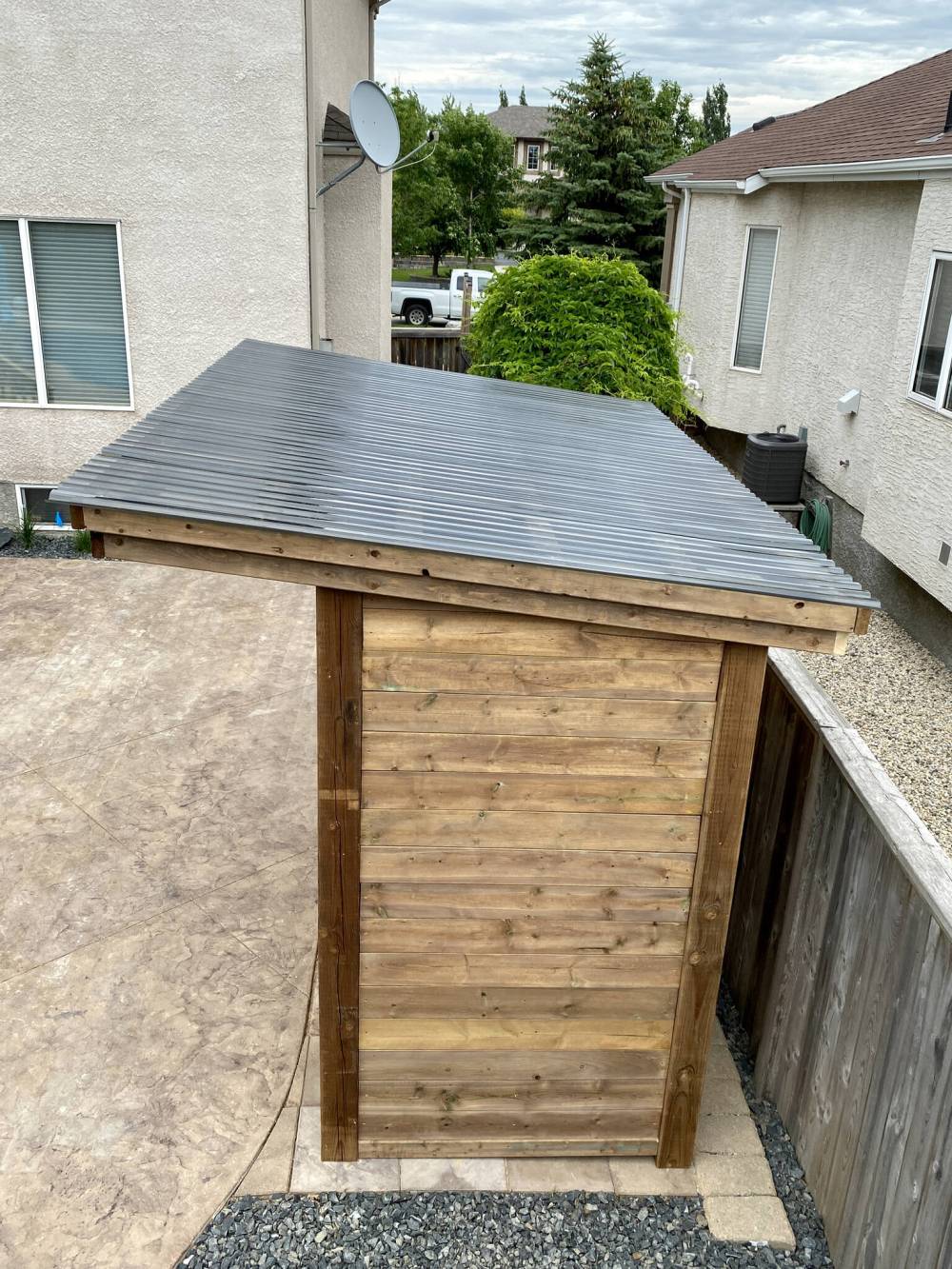Marc LaBossiere / Winnipeg Free Press
The shed roof is sloped towards the fence line, providing shelter from rain.