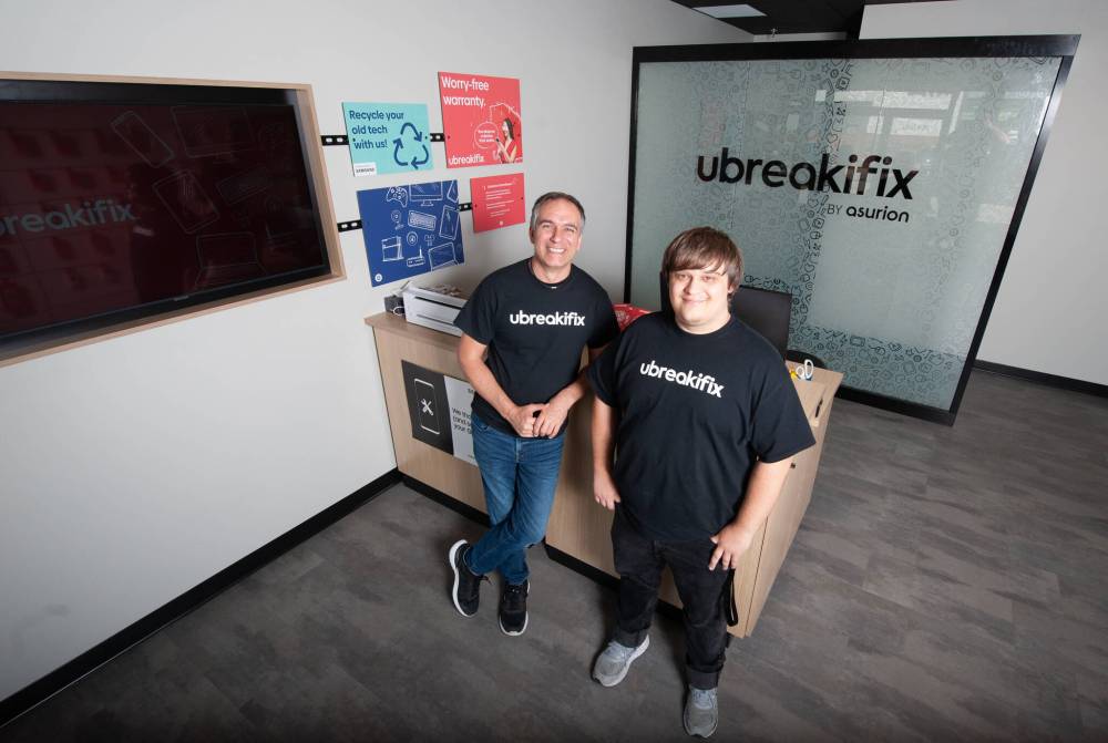ETHAN CAIRNS / WINNIPEG FREE PRESS
                                Mike (left) and Josiah Wiebe opened the first Manitoba uBreakiFix, a certified repair centre for Samsung Galaxy smartphones as well as Google Pixel products and an Apple limited repair service provider, in the Northgate Shopping Centre.