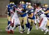 Paul Chiasson / THE CANADIAN PRESS
                                Blue Bombers running back Brady Oliveira fends off Montreal Alouettes linebacker Micah Awe during fourth quarter CFL football action in Montreal last Thursday.