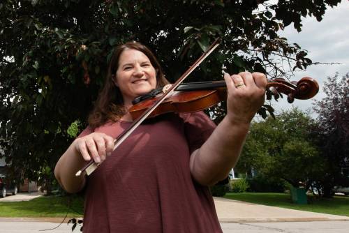 ETHAN CAIRNS / WINNIPEG FREE PRESS
                                Patti Kusturok is the organizer for the 32nd Canadian Grand Masters Fiddling Competition, being held this weekend in Winnipeg for the first time.