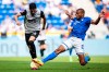 Augsburg's Ricardo Pepi, left, and Hoffenheim's Kevin Akpoguma challenge for the ball during the German Bundesliga soccer match between TSG 1899 Hoffenheim and FC Augsburg in Sinsheim, Germany, Saturday, Aug. 27, 2022. (Tom Weller/dpa via AP)