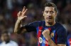 Barcelona's Robert Lewandowski celebrates after scoring his side's fourth goal during a Group C Champions League soccer match between FC Barcelona and Viktoria Plzen at the Camp Nou stadium in Barcelona, Spain, Wednesday, Sept. 7, 2022. (AP Photo/Joan Monfort)