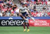 Vancouver Whitecaps' Jake Nerwinski, front, and Colorado Rapids' Jonathan Lewis vie for the ball during the second half of an MLS soccer game in Vancouver, on Wednesday, August 17, 2022. THE CANADIAN PRESS/Darryl Dyck