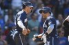Chicago Cubs' Yan Gomes, right, celebrates with teammate Nico Hoerner, left, after hitting a two-run home run during the second inning of a baseball game against the San Francisco Giants, Friday, Sept. 9, 2022, in Chicago. (AP Photo/Paul Beaty)