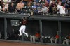 Baltimore Orioles right fielder Kyle Stowers (83) leaps in vain for a ball that went for a two-run home run by Boston Red Sox's Xander Bogaerts during the third inning of a baseball game, Friday, Sept. 9, 2022, in Baltimore. (AP Photo/Nick Wass)