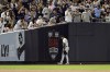 New York Yankees left fielder Aaron Hicks reacts after missing a catch on a RBI double hit by Tampa Bay Rays' Wander Franco during the fourth inning of a baseball game Friday, Sept. 9, 2022, in New York. (AP Photo/Adam Hunger)