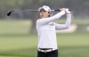 Narin An, of South Korea, watches her approach shot on the second hole during the final round of the LPGA Tour Kroger Queen City Championship golf tournament in Cincinnati Sunday, Sept. 11, 2022. (AP Photo/Paul Vernon)