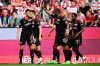 Union's players celebrate the opening goal during the German Bundesliga soccer match between 1. FC Cologne and 1. FC Union Berlin in Cologne, Germany Sunday, Sept. 11, 2022. Union Berlin fans are reveling in the view from the top of the Bundesliga for the first time this week. “Other times will come but let us enjoy the moment,” the club said on Twitter after Sunday’s 1-0 win in Cologne lifted Urs Fischer’s team top of Germany’s first division after six rounds. (Federico Gambarini/dpa via AP)