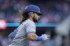 Toronto Blue Jays' Bo Bichette sprints out of the batter's box after hitting a double in the first inning of baseball game against the Texas Rangers in Arlington, Texas, Saturday, Sept. 10, 2022.The shortstop has been named the American League's player of the week. THE CANADIAN PRESS/AP-Tony Gutierrez