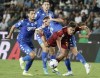 Roma's Paulo Dybala, right, fights for the ball with Empoli's Razvan Gabriel Marin, center, and Filippo Bandinelli, left, during the Serie A soccer match between Empoli and Roma, in Empoli, Italy, Monday, Sept. 12, 2022. (Marco Bucco/LaPresse via AP)