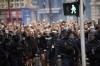 Eintracht Frankfurt fans are escorted by French riot police officers prior to the Champions League soccer match between Olympique de Marseille and Eintracht Frankfurt at the Velodrome stadium in Marseille, south of France, Tuesday, Sept. 13, 2022. French authorities in Marseille have ordered a partial ban on alcohol sales and banned Frankfurt fans from travelling on their own ahead of Tuesday's high-risk Champions League match at the Stade Velodrome. (AP Photo/Daniel Cole)