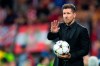 Atletico coach Diego Simeone gestures on the sidelines during a Champions League Group B soccer match between Bayer 04 Leverkusen and Atletico Madrid in Leverkusen, Germany, Tuesday, Sept. 13, 2022. (Marius Becker/dpa via AP)