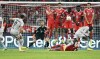 Barcelona's Robert Lewandowski (9) shoots a free kick against Munich during a Champions League, group C soccer match between Bayern Munich and Barcelona at the Allianz Arena in Munich, Germany, Tuesday, Sept. 13, 2022. (Sven Hoppe/dpa via AP)