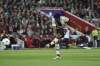 Ajax's Mohammed Kudus scores his side's opening goal during the Champions League group A soccer match between Liverpool and Ajax at Anfield stadium in Liverpool, England, Tuesday, Sept. 13, 2022. (AP Photo/Rui Vieira)