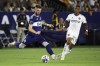 Vancouver Whitecaps defender Tristan Blackmon, left, moves the ball past LA Galaxy forward Douglas Costa during the second half of an MLS soccer match&nbsp;in Carson, Calif.,&nbsp;Saturday, Aug. 13, 2022. With just four games left on the schedule, the 'Caps (9-14-7) are on a three-game losing skid and their playoff hopes have all but evaporated. THE CANADIAN PRESS/AP-Raul Romero Jr.