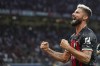 AC Milan's Olivier Giroud celebrates after scoring a goal during the Champions League, Group E soccer match between AC Milan and Dinamo Zagreb, at the San Siro stadium in Milan, Italy, Wednesday, Sept. 14, 2022. (Spada/LaPresse via AP)