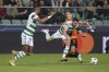 Celtic's Matt O'Riley, centrer, challenges for the ball with Shakhtar's Marian Shved, right, during a Champions League group F soccer match between Shakhtar Donetsk and Celtic at Wojska Polskiego stadium, in Warsaw, Poland, Wednesday Sept. 14, 2022. (AP Photo/Michal Dyjuk)