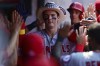 Los Angeles Angels' Mickey Moniak is congratulated in the dugout after hitting a two-run home run offCleveland Guardians starting pitcher Cal Quantrill during the third inning of a baseball game, Wednesday, Sept. 14, 2022, in Cleveland. (AP Photo/David Dermer)