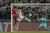 Benfica's Goncalo Ramis, left, and Juventus' Leonardo Bonucci jump for the ball as Juventus' goalkeeper Mattia Perin prepare to save the ball during a Champions League group H soccer match between Juventus and Benfica at the Allianz stadium,Turin, Italy, on Wednesday, Sept. 14, 2022. (AP Photo/Antonio Calanni)