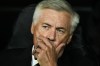 Real Madrid's head coach Carlo Ancelotti sits in the bench prior the Champions League group F soccer match between Real Madrid and Leipzig at the Santiago Bernabeu stadium in Madrid, Wednesday, Sept. 14, 2022. (AP Photo/Manu Fernandez)