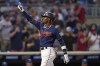 Minnesota Twins' Nick Gordon celebrates while crossing home plate after hitting a two-run home run against the Kansas City Royals during the second inning of a baseball game Thursday, Sept. 15, 2022, in Minneapolis. (AP Photo/Abbie Parr)