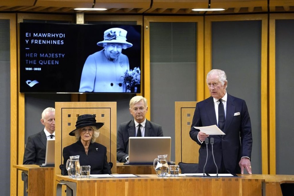 King Charles III, right, speaks with Camilla the Queen Consort at left, after receiving a Motion of Condolence at the Senedd, following the death of Queen Elizabeth II, in Cardiff, Friday, Sept. 16, 2022. King Charles III and Camilla, the Queen Consort, arrived in Wales for an official visit. The royal couple previously visited to Scotland and Northern Ireland, the other nations making up the United Kingdom, following the death of Queen Elizabeth II at age 96 on Thursday, Sept. 8.
(Andrew Matthews/Pool Photo via AP)