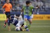 Seattle Sounders forward Fredy Montero, right, is fouled by Vancouver Whitecaps midfielder Andres Cubas during the second half of an MLS soccer match in Seattle, Tuesday, June 14, 2022. For the second year in a row, the Vancouver Whitecaps need a big result against their regional rivals in order to preserve their faint playoff hopes. THE CANADIAN PRESS/AP-Ted S. Warren