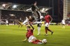 Nottingham Forest's Neco Williams tackles Fulham's Willian during the English Premier League soccer match between Nottingham Forest and Fulham, at The City Ground, Nottingham, England, Friday Sept. 16, 2022. (Tim Good/PA via AP)