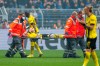 Dortmund's Marco Reus is carried off the pitch during the German Bundesliga soccer match between Borussia Dortmund and FC Schalke 04 in Dortmund, Germany, Saturday, Sept. 19, 2022. (David Inderlied/dpa via AP)