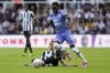 Newcastle United's Miguel Almiron and Bournemouth's Jordan Zemura, right, vies for the ball during the English Premier League soccer match between Newcastle United and Bournemouth, at St James' Park, in Newcastle, England, Saturday, Sept. 17, 2022. (Owen Humphreys/PA via AP)