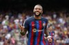 Barcelona's Memphis Depay celebrates after scoring his side's second goal during a Spanish La Liga soccer match between FC Barcelona and Elche CF at Camp Nou stadium in Barcelona, Spain, Saturday, Sept. 17, 2022. (AP Photo/Joan Monfort)