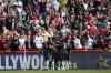 Arsenal players celebrates after their teammate Fabio Vieira scored his side's third goal during the English Premier League soccer match between Brentford and Arsenal, at the Gtech Community stadium, London, Sunday, Sept.18, 2022. (AP Photo/David Cliff)