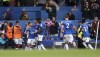 Everton's Neal Maupay celebrates scoring their side's first goal of the game with team-mates et during the English Premier League soccer match between Everton and West Ham, at Goodison Park, Liverpool, England, Sunday Sept. 18, 2022. (Isaac Parkin/PA via AP)