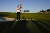 Bob MacIntyre of Scotland holds the trophy after winning the Italian Open golf tournament in Guidonia Montecelio, near Rome, Italy, Sunday, Sept. 18, 2022. The Italian Open took place on the Marco Simone course that will host the 2023 Ryder Cup. (AP Photo/Alessandra Tarantino)