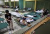 Residents affected by Hurricane Fiona rest at a storm shelter in Salinas, Puerto Rico, Monday, Sept. 19, 2022. (AP Photo/Stephanie Rojas)